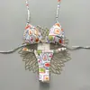 2026 Venda Quente Transfronteiriça Parceria Estampa de Desenho Animado Europeia e Americana Biquíni Sexy de Duas Peças com Decote Halter Roupa de Banho para Férias na Praia