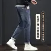 Jeans Masculino de Cintura Alta Tendência Marca de Luxo Corte Reto Solto Primavera/Outono 2026 Novo Versátil Elástico Casual Calça Longa