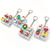 Navidad 9 Teclas Alivio del Estrés Botón Luminoso Juguete para Aliviar el Estrés Keycap Llavero Teclado DIY Juguete para Aliviar el Estrés Colgante