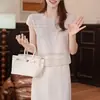 Conjunto de moda de alta qualidade para mulheres, nova coleção de verão 2026: conjunto de duas peças: top de malha vazada em seda gelada e saia midi modeladora