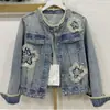Chaqueta de Mezclilla Deshilachada Estilo Diseñador para Mujer Primavera y Otoño 2026 Nueva Ropa de Mezclilla Resistente con Cuentas Chaqueta para Mujer