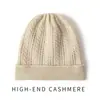 Cachemira Otoño/Invierno 2026 Nuevo de Alta Gama para Mujer Color Sólido Tejido Cálido Moda Tejido de Cable Hueco Borde Enrollado Sombrero Casual