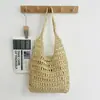 Bolso de paja tejida hecho a mano con diseño calado de gran capacidad para mujer, nuevo bolso de paja de estilo francés simple para vacaciones en la playa y uso en la playa
