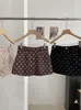 Falda corta de lunares dulces estilo coreano KEKEZOON para mujer, de cintura alta, adelgazante, versátil y anti-exposición al por mayor 9154