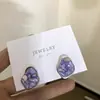 Brincos florais de pérola iridescente com folha de ouro, elegantes e sofisticados, com um design único, requintados e simples, acessório versátil