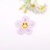 Venda quente 5,5 cm rosto sorridente flor de cinco pétalas adesivos de tecido acessórios para presilha diy acessórios para roupas bordado pedaço de flor pequena adesivos de tecido