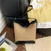 Bolso Tejido de Mujer 2026 Nuevo Bolso de Paja de Verano Bolso de Hombro para Vacaciones en la Playa Bolso Cruzado Tipo Cubo de Gran Capacidad