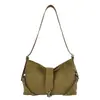 Elegante y minimalista bolso tote de color liso para mujer, con un diseño único, perfecto para el trabajo y los desplazamientos en la temporada de otoño de 2026.