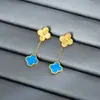 Nuevo Collar de Acero de Titanio con Trébol de Cuatro Hojas de Oro de 18 Quilates Conjunto de Tres Piezas de Collar, Pulsera y Pendientes de Flor de Cuatro Hojas para Mujer Collar de Nácar Venta al por Mayor
