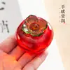 Directo de fábrica caqui Ruyi pisapapeles caqui vidrio decoración del hogar pluma pincel caligrafía mesa de té tapa de taza portavasos de té
