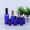 Botella de aceite esencial de vidrio azul en stock, botella de emulsión de 30 ml, botella pequeña de aceite esencial, botella de perfume de 5 ml, botella de aceite esencial azul.