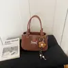 Bolso pequeño plisado súper popular para mujer, nuevo modelo 2026, de alta gama, lujo ligero, nicho, único, bolso cruzado para hombro, moderno