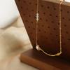 Collar con colgante de perla de agua dulce incrustada en oro rosa de 18 quilates chapado en acero de titanio simple y versátil de nicho de nueva moda francesa