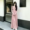 Conjunto Elegante Estilo Otoño Temprano 2026 Top de Manga Larga con Cuello en V Falda de Cintura Alta con Lazo Conjunto de Dos Piezas de Moda Elegante para Mujer