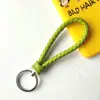 Llavero creativo de cuerda de cuero tejido a mano para pareja, llavero de coche, llavero al por mayor, colgante para bolso