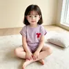 Nueva ropa para niñas de comercio exterior transfronterizo: conjunto de camiseta de rayas con top de lazo y shorts, conjunto sencillo de dos piezas de manga corta para niños