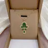 Collar de mujer: Collar de flor de circón esmeralda estilo europeo y americano transfronterizo, colgante de nuevo diseño, cadena elegante para la clavícula