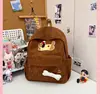Mochila linda de cachorro estilo ins japonés para estudiantes de secundaria femeninas, mochila de pana, mochila casual de campus para estudiantes universitarios
