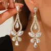 Brincos Transfronteiriços de Luxo Leve com Pedras de Cristal em Formato de Gota para Mulheres, Brincos Longos de Cristal Estilo Europeu e Americano, Brincos e Joias de Moda de Alta Qualidade