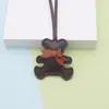 Charme de Bolsa Ursinho com Laço Tendência Mais Vendido Acessório de Moda Chaveiro de Couro Ursinho Pet