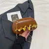 Bolso de mujer 2025 otoño nuevo modelo bolso de axila para ir al trabajo, bolso de hombro cruzado de diseño de nicho moderno y simple