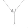Collar de mariposa de luz y sombra viento frío cadena de colgante explosivo para mujer collar flash cadena de clavícula de nicho de alta lujo al por mayor