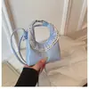 Nueva colección de verano 2026: bolso de hombro pequeño, bolso cruzado y bolso de mano elegantes y chic con diseño en forma de nube para mujer