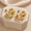 Pendientes Geométricos Trenzados Retorcidos en Forma de C Estilo Nuevo Europeo y Americano Oro 18K Otoño e Invierno Pendientes Elegantes de Alta Gama Venta al por Mayor