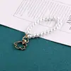 Bolso de Perlas Artificiales Cadena de Perlas Cadena Corta Llavero Cadena Colgante Funda de Teléfono Móvil Llavero Colgante Decorativo Pequeños Accesorios de Joyería