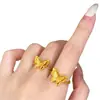 Anel de ouro tipo loja de joias, ouro de areia, laço duplo tridimensional para mulheres, moderno, simples, design de nicho, anel ajustável de alta qualidade
