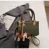 Design Niche Coreano Simples e Fashionável Bolsa de Trabalho para Mulheres 2026 Verão Nova Versátil Transversal Bolsa Quadrada Pequena Simples