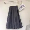 Saia Floral para Mulheres, Novo Estilo Verão 2026, Design Emagrecedor de Cintura Alta Linha A, Saia Rodada de Comprimento Médio