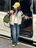 Traje de Niña Otoño e Invierno 2025 Nuevo Conjunto de Dos Piezas de Cardigan de Punto Otoñal para Niña Pantalones de Pierna Ancha de Mezclilla para Niña