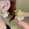 Pendientes Metálicos Calados de Flor de Aguja Plateada Europeos y Americanos Transfronterizos, Pendientes de Moda, Simples, Versátiles, de Lujo Ligero, Pendientes de Gama Alta para Mujer