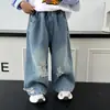 Jeans rotos de primavera y otoño para niños 2026 otoño nuevo estilo coreano geniales para bebé callejeros sueltos casuales de moda