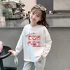 Camiseta de manga larga 100% algodón para niña para primavera y otoño 2026, elegante camiseta básica infantil con estampado de dibujos animados para niñas pequeñas