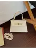 Bolso de mano de alta gama para mujer 2026 nuevo moda de verano moderno bandolera para el día a día bolso pequeño cuadrado cruzado