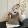 Bolso cubo tejido hueco transfronterizo 2026 nuevo de moda de alta gama para el hombro y cruzado gran capacidad versátil para el día a día