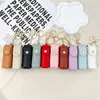 Bolsa de Almacenamiento de Labiales Transfronteriza, Estuche Portátil para Labiales, Neceser, Billetera para Monedas de Regalo, Caja de Almacenamiento a la Moda, Colgante