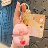 Llavero de muñeca de dibujos animados creativos que te asustan soplando burbujas para llaves de coche, estudiante, mochila escolar, colgante pequeño, regalo pequeño, venta al por mayor