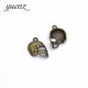 YuenZ Accesorios para joyería DIY Colgante de casco de fútbol de aleación Colgante pequeño de aleación retro N140
