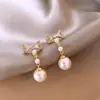 Oferta especial: Lujo Ligero Estilo Francés, Pendientes de Perlas con Lazo de Moda y Elegancia para Mujer, Modelo Nuevo con Borlas Exquisitas y un Toque de Alta Gama
