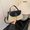 Bolso de mano tejido de patchwork de verano, diseño de nicho, bolso de hombro moderno con bloques de color, bolso de playa