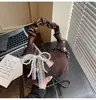 Bolso de Mano de Nicho Estilo Coreano Transfronterizo Bolso Dumpling para Mujer Otoño 2026 Nuevo Plegado Casual Versátil Bolso de Hombro Cruzado