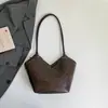 Bolso de mujer de moda coreana, nicho, nuevo bolso de hombro de moda primavera 2026, bolsa de mano de gran capacidad para el día a día