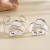 Set de anillo y pulsera plisados brillantes florales de estilo metálico europeo y americano, joyería minimalista de nicho de alta gama para mujer