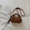 Exquisito bolso retro de gamuza de nicho para mujer, nuevo modelo 2026, bolso cruzado casual versátil, bolso de mano pequeño súper popular