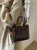 Bolsa Feminina de Nicho Francês Outono e Inverno 2025 Nova Bolsa de Ombro Estilo Retro para o Dia a Dia e Trabalho Bolsa Transversal