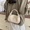 Bolso tipo empanada con diseño único de tejido para mujer, nuevo bolso de mano y bandolera estilo coreano 2026, versátil y elegante para el trabajo