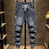 Jeans Masculino Novo de Primavera e Outono Calças Masculinas Calças Largas com Barra Ajustada Ins Estilo Distinto e Casual Design de Nicho